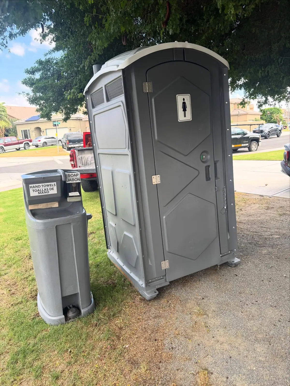 Standard unit with a handwashing station on a lawn